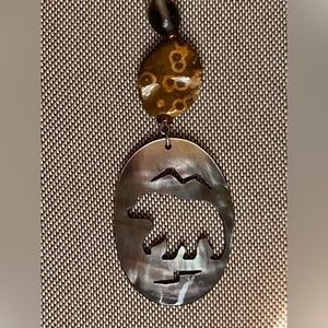 Vintage Native American cut out pearl Inlaid Zuni Bear necklace stone pendant
